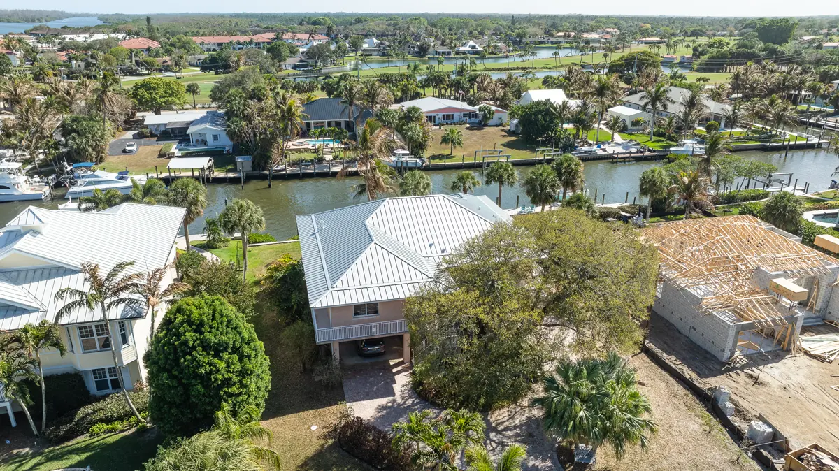 White metal roof on canal-front home