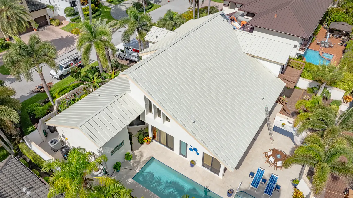 White standing seam metal roof with pool